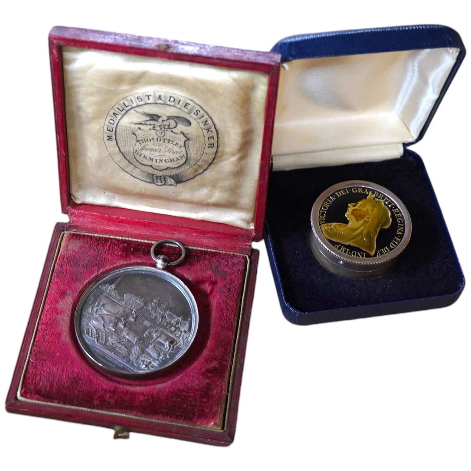 A modern enamelled silver crown coin inset circular pill box, by C.S. Green & Co and an 1863 agricultural prize medallion. Condition - fair.